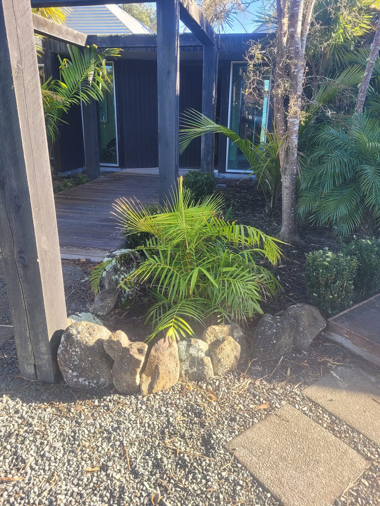 A simple and effective makeover using reclaimed railway sleepers to transform a small, untidy space into a neat and functional area. - Before