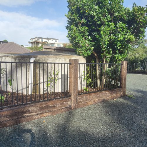 Sleeper-Mounted Iron Fence - After