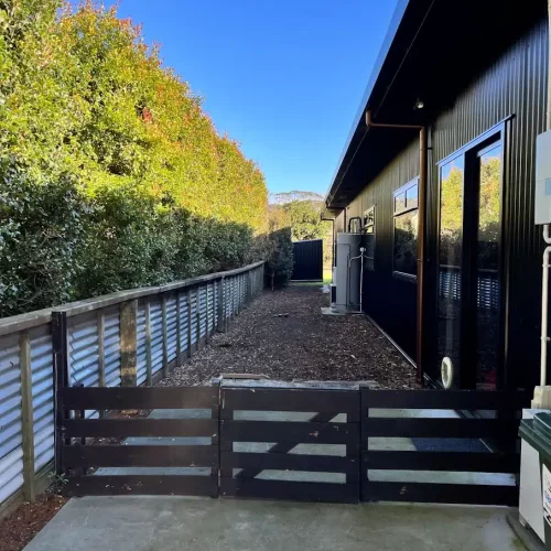 Steel Fence & Mulch Path - Before